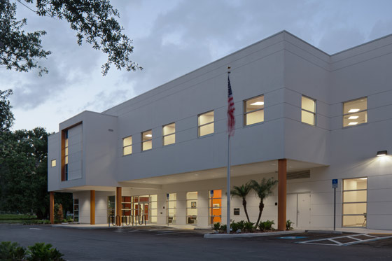 Wide view of library exterior in evening